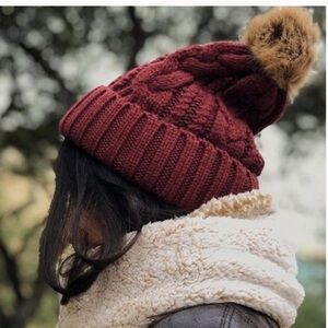 Urban Outfitters maroon cable knit beanie pom pom